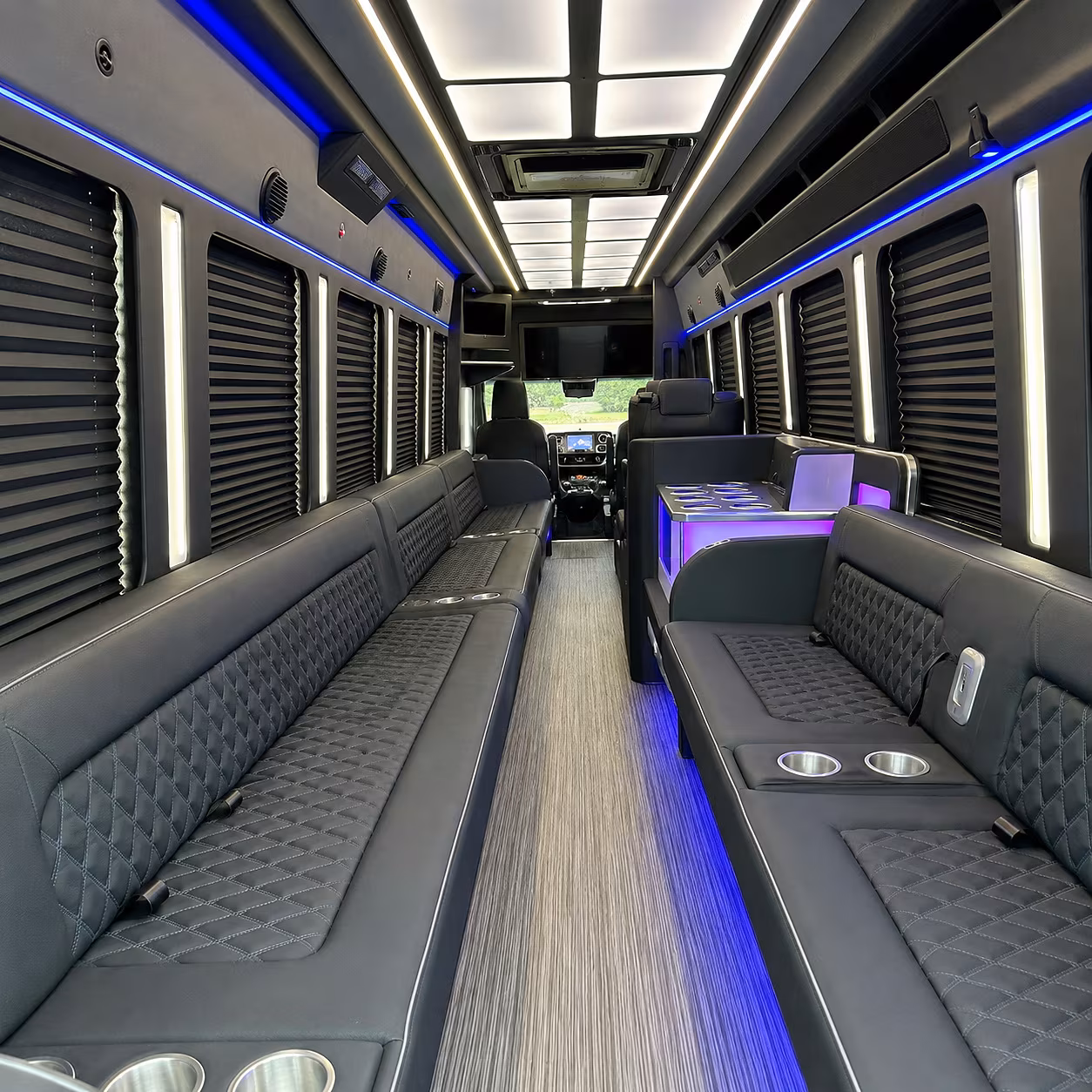 Group beside a Mercedes Sprinter limo in Pompano Beach